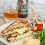 This chicken, brie, and apple panini sandwich, sweetened with a drizzle of honey, comes together in minutes and is perfect for a quick weeknight dinner.