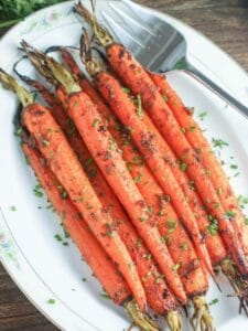 Overhead shot of Roasted Carrots with Miso Butter on a platter.