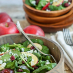 This sweet and tangy spinach salad with poppy seed dressing is loaded with fruit and crumbly blue cheese and makes a great a starter or light meal.