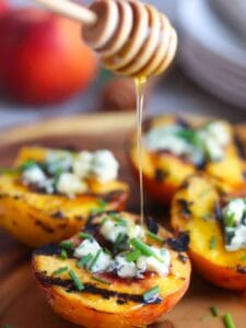 Grilled peaches topped with blue cheese and drizzled with honey.