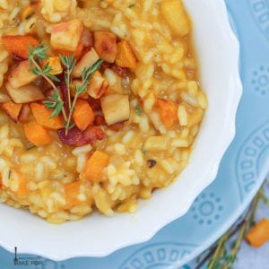 Butternut Squash and Apple Risotto in a bowl garnished with thyme