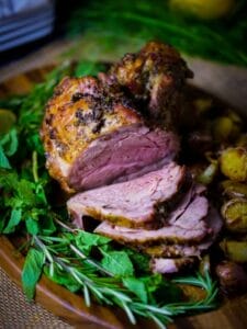 Boneless Roasted Leg of Lamb sliced and ready to serve.