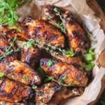 There’s nothing better than garlic and herb grilled chicken wings right off the fire. The ultimate outdoor party food!