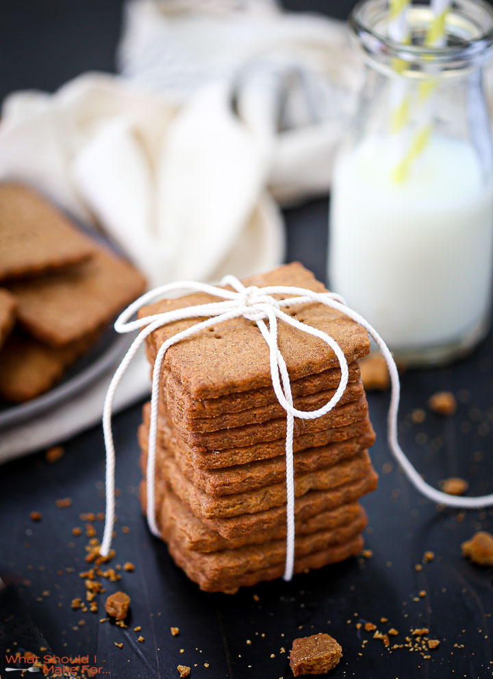 A stack of Homemade Graham Crackers tied up with a white string.