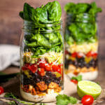 Layered Mexican Salad in a Jar all ready to shake.