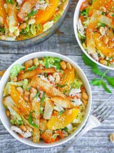 Servings of Chinese Chicken Salad in white bowls.