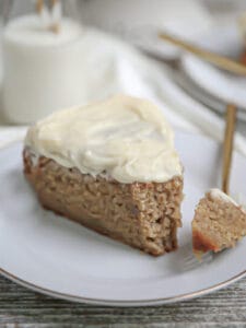 A slice of easy banana cake with a bite cut off.
