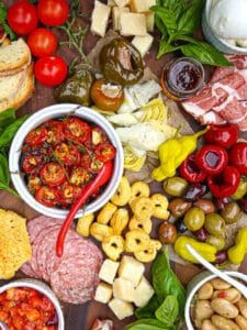 Roasted cherry tomatoes are the star of this Italian grazing board.