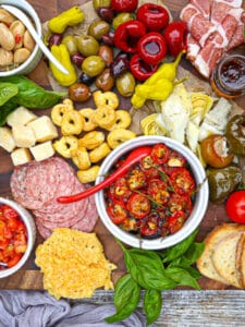 Roasted cherry tomatoes are the star of this Italian grazing board.