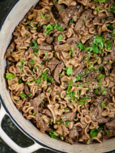 Overhead shot of Beef Stroganoff freshly cooked and sprinkled with parsley.