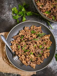 Beef Stroganoff garnished with parsley.